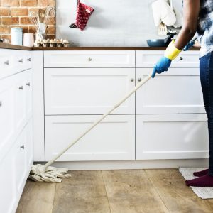 Black woman doing house chores